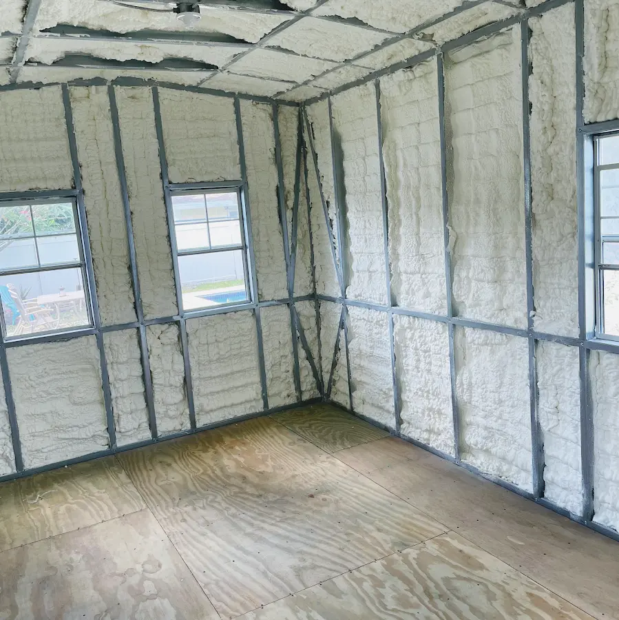 Closed-cell spray foam insulation applied to wall cavities in a residential project in High Point