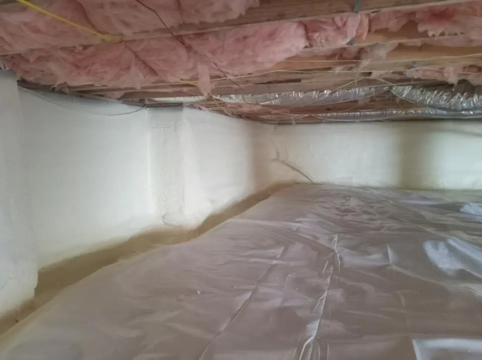 Crawl space encapsulation with closed-cell spray foam for Commercial Roof Restoration in High Point